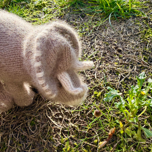 close up of cashmere triceratops cuddly dinosaur toy